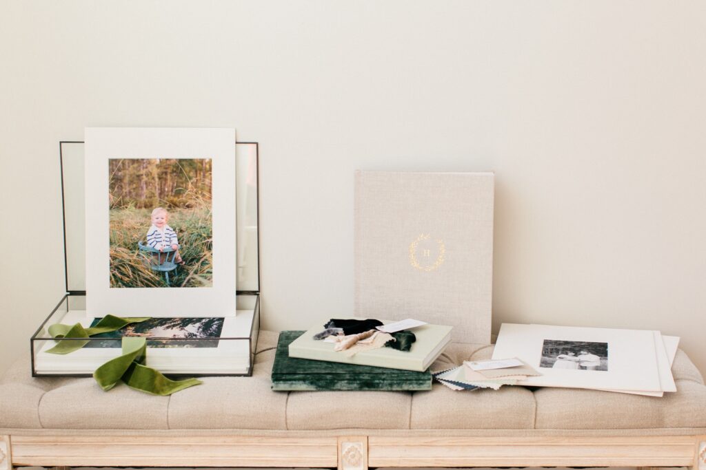 one year old boy in matted fine art print with heirloom samples in north idaho photography studio