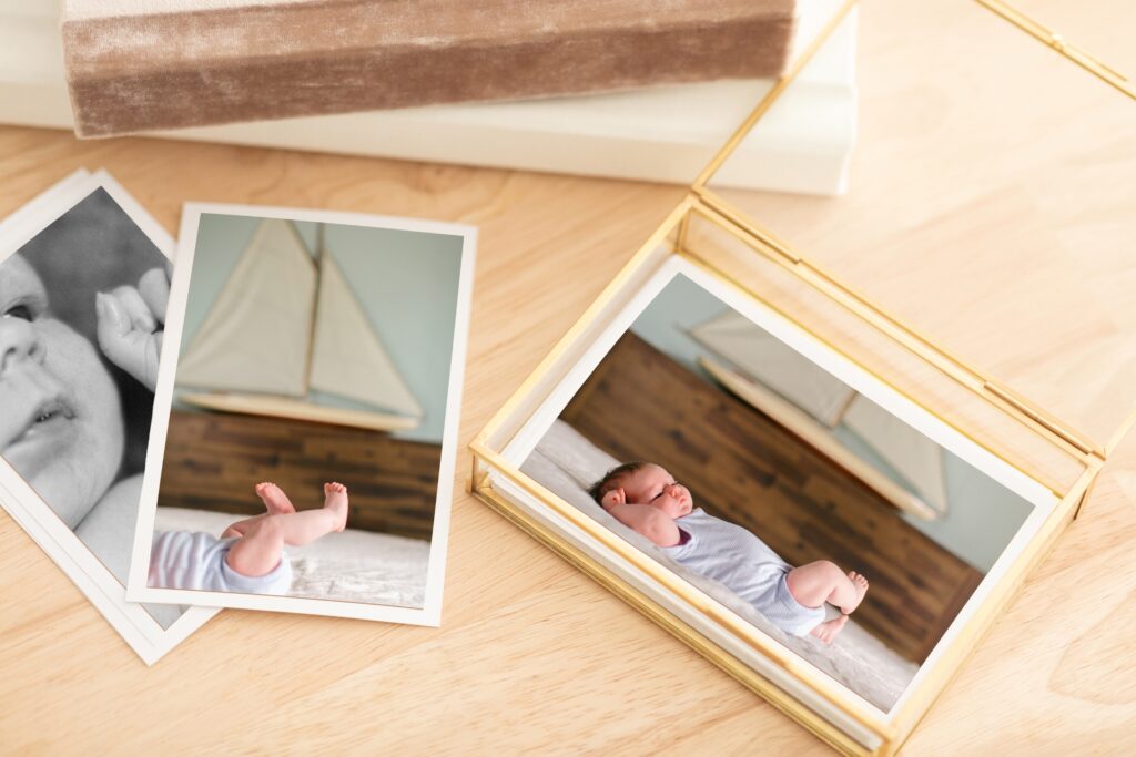 coeur d'alene newborn photography fine art prints in a glass case