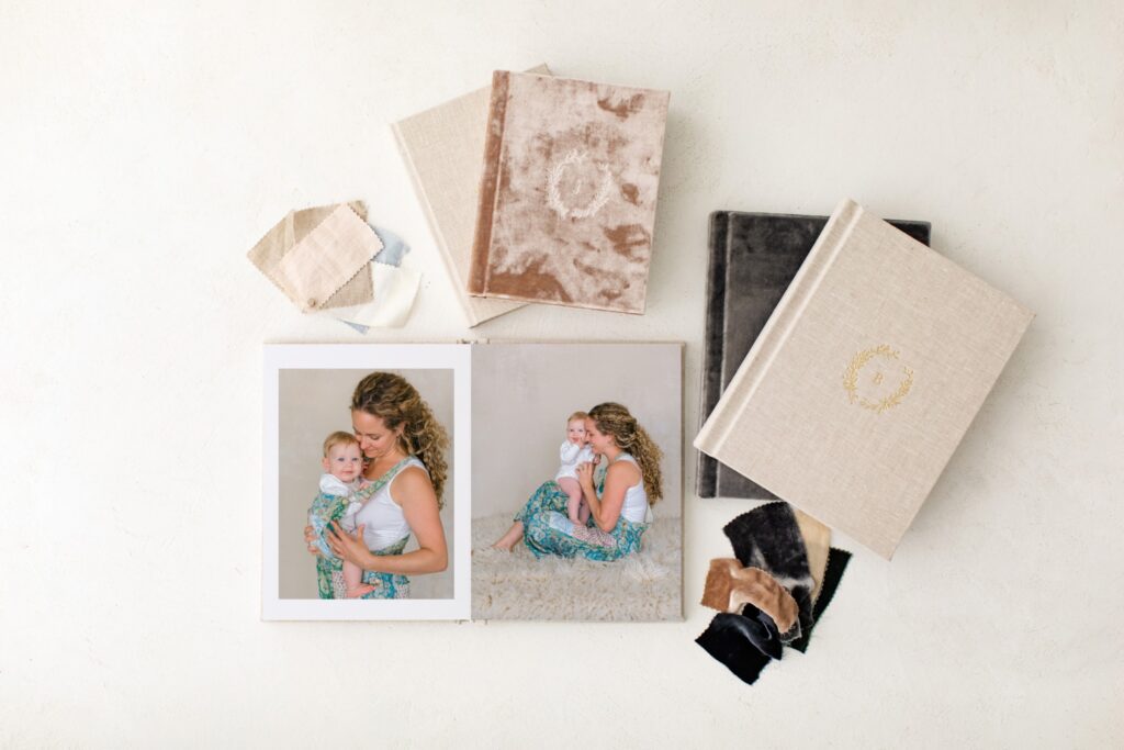 heirloom albums of a milestone session with mom and little boy in a studio in coeur d'alene idaho