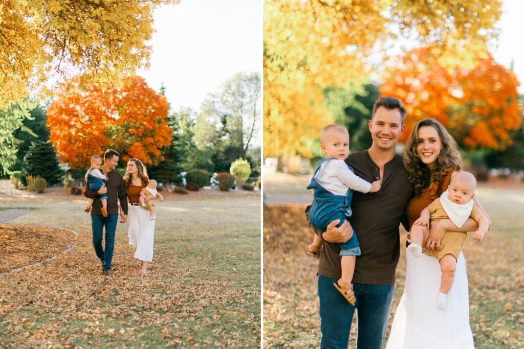 young family walking through park during golden hour in north idaho surrounded by fall colors